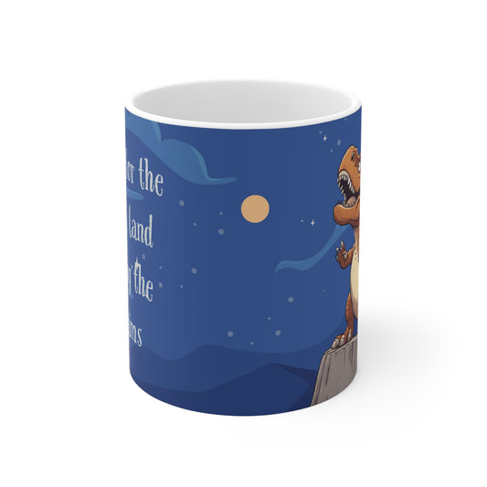 a blue coffee mug with a dinosaur on it and the night sky and a quote