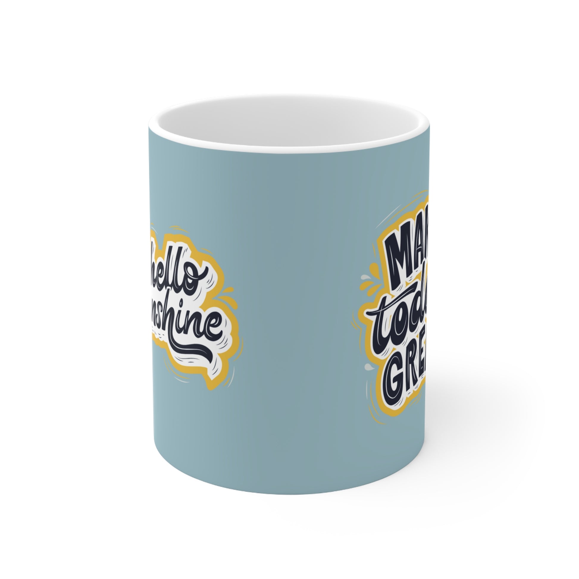 a blue coffee mug with a yellow and white design