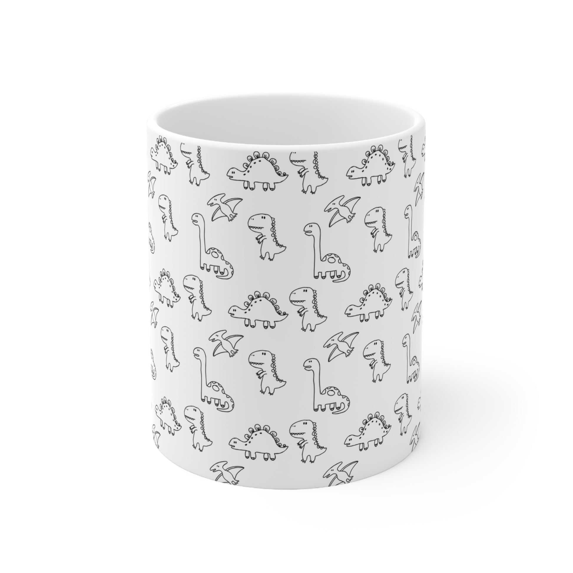 Front view of Mug showing wrap around pattern of black and white cartoon dinosaurs