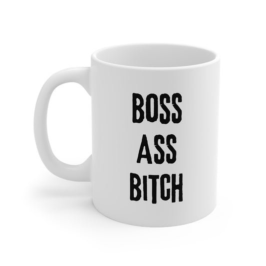 View of mug with handle on left and large black text