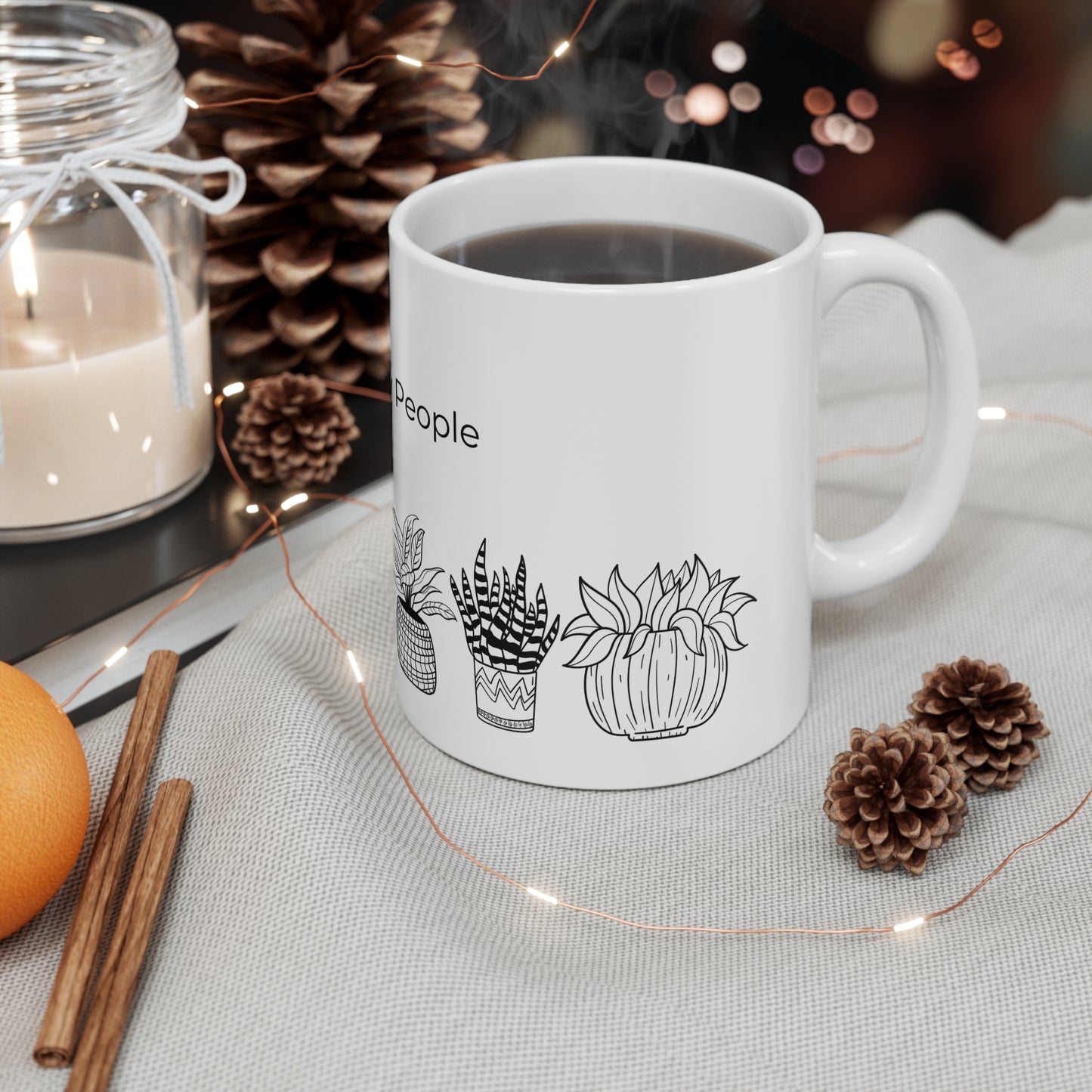 a cup of coffee sitting on top of a table